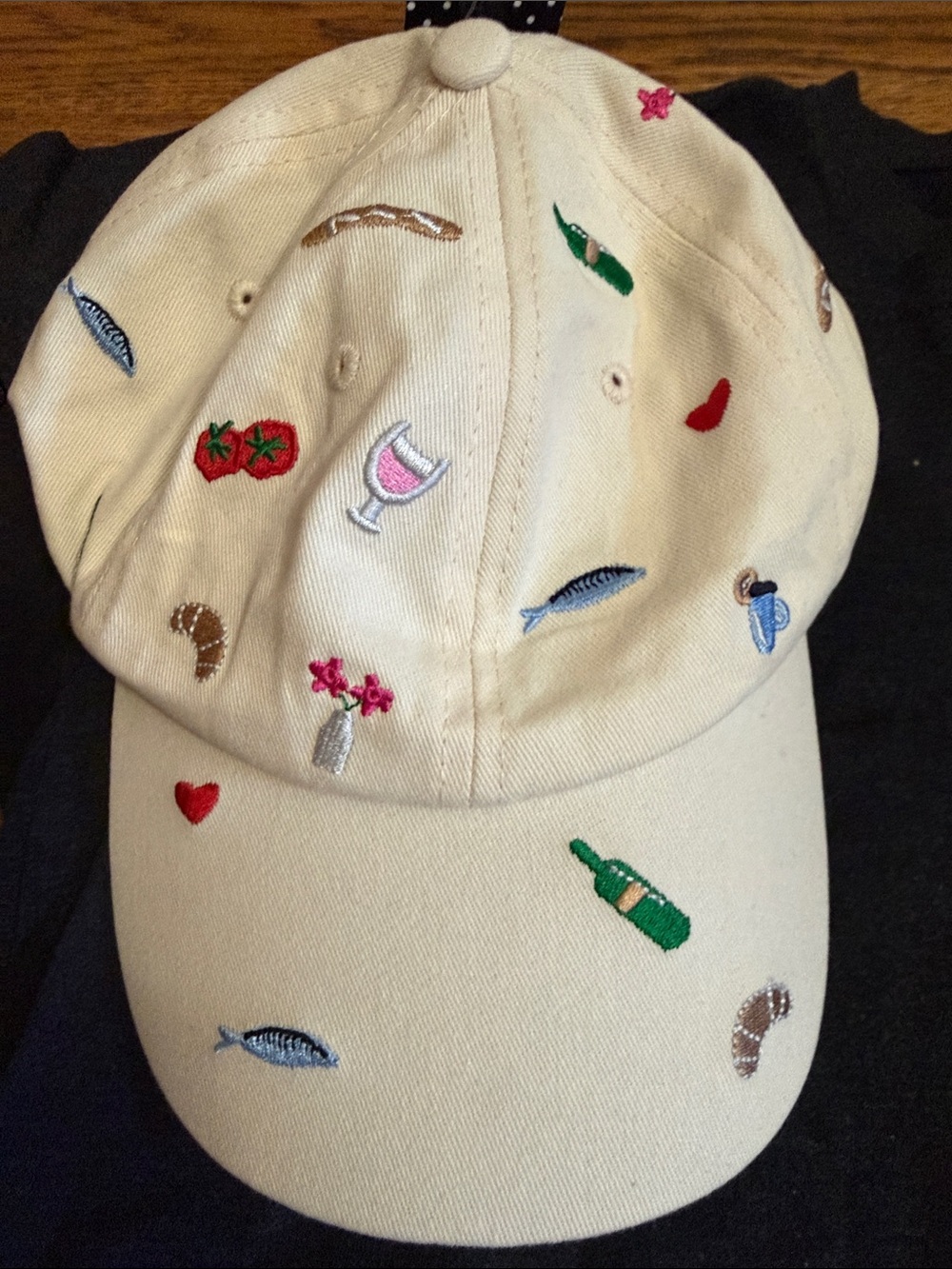 Beige Embroidered Baseball Cap with Playful Motifs